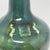 Vintage French ceramic bottle originally made for Gaston de Lagrange cognac, finished in a beautifully mottled green glaze...