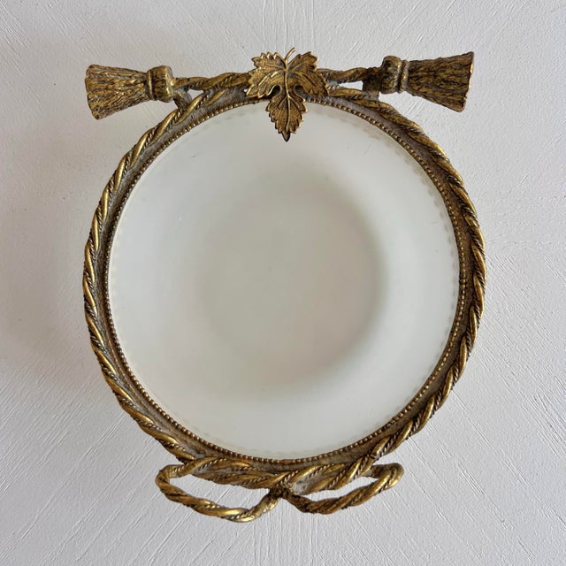 Antique French Belle Époque decorative catchall, featuring a luminous white opaline glass insert, exquisitely mounted in...