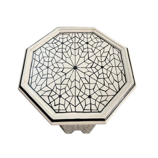 A recently handcrafted side table from Morocco. Featuring a classic octagonal silhouette and traditional Moorish arch...