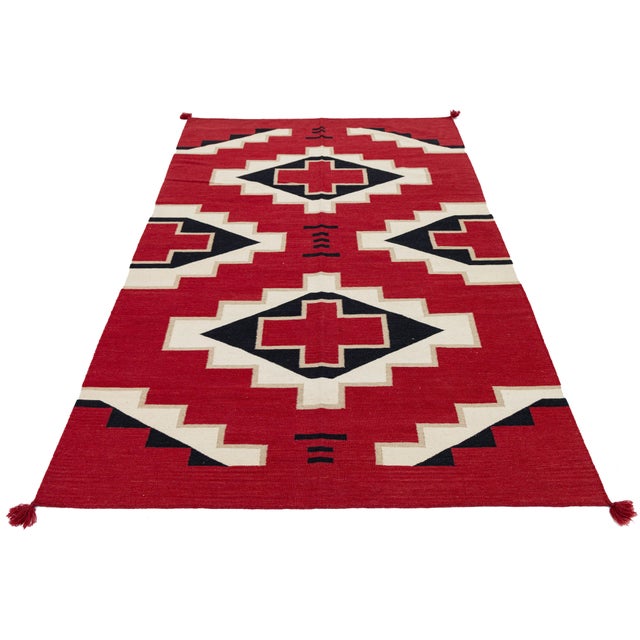 This stunning handmade wool rug captures the soul of traditional Southwest artistry with a contemporary edge. Featuring a...