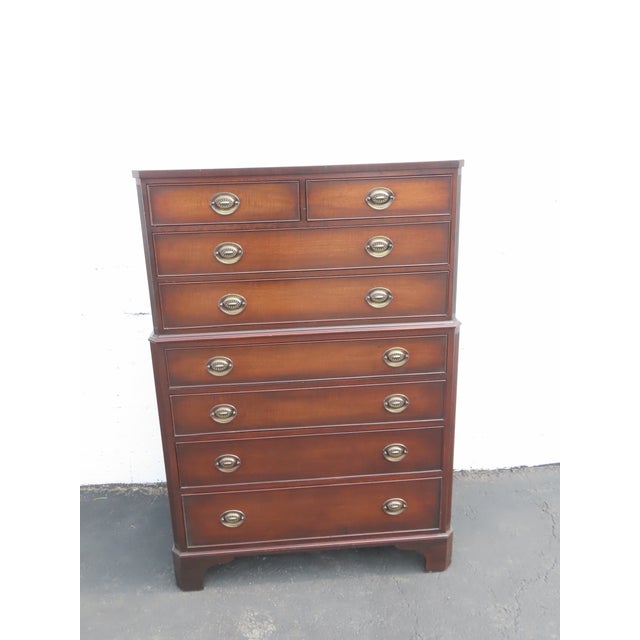 This classic Chest of Drawers is made out of wood, solid wood, mahogany, and mahogany veneer. It was made by Kindel and it...