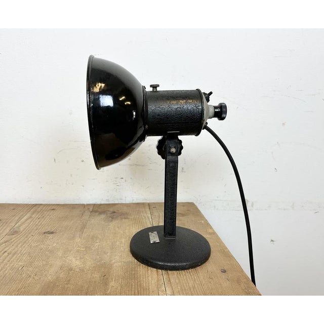 Vintage Industrial adjustable table lamp from former Czechoslovakia made during the 1950s. Was used in photo studios. It...