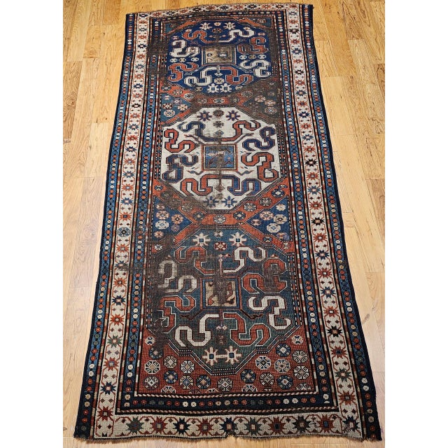A rare and collectible 19th century Caucasian Cloudband Kazak rug, also known as a Chondsoresk, hand-woven in the late...