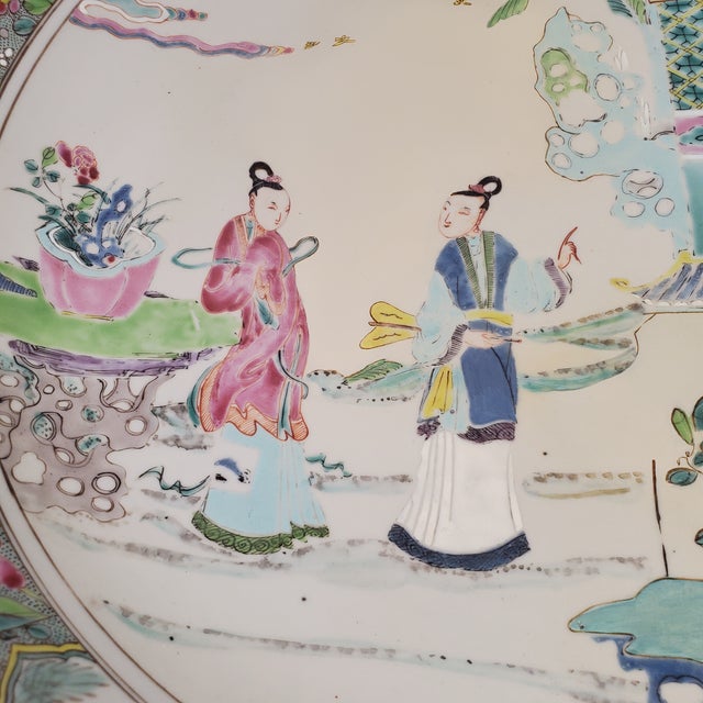 A wonderful large platter with a single scene covering 14". Painted in pastel shades