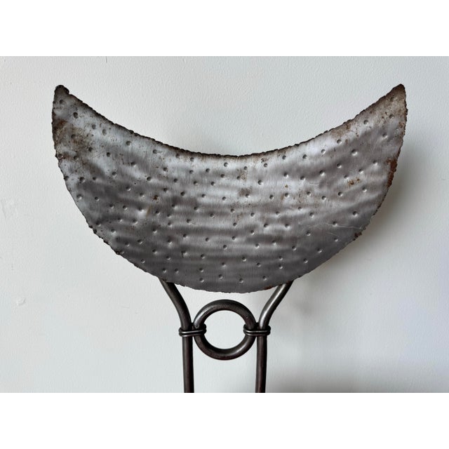 A striking example of 1980’s Brutalist design, this handmade metal accent chair showcases a bold sculptural presence with...