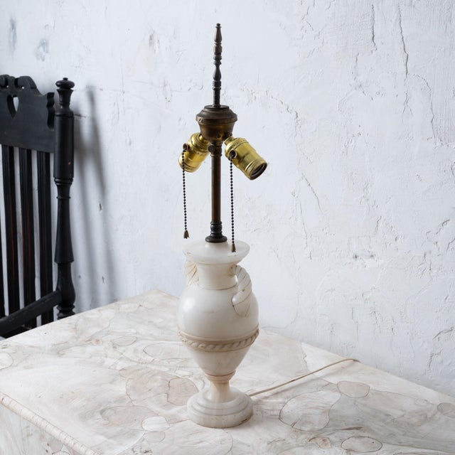 A neoclassical alabaster urn lamp, France, early 20th century.