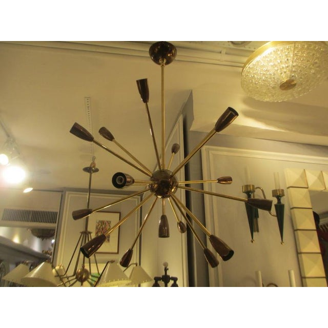 Bespoke Brass and copper sputnik chandelier with 14 arms.