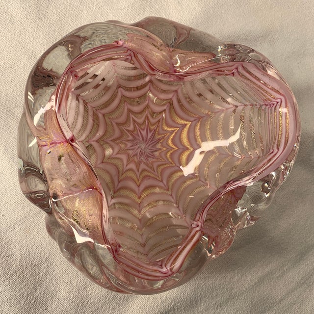 Up for sale is a stunning, authentic piece of mid-century Italian artistry: a hand-blown Murano art glass biomorphic bowl...
