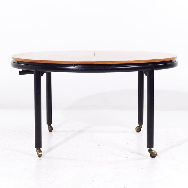 Michael Taylor for Baker Mid Century Expanding Dining Table with 2 Leaves This table measures: 54.25 wide x 46 deep x 29...