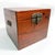 This antique handmade wooden storage chest with substantial solid-wood construction, traditional dovetailed corner joinery...