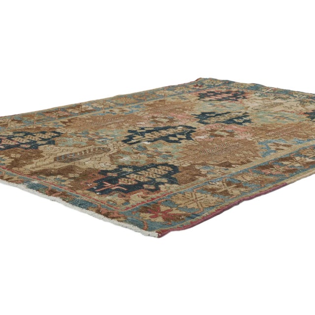Distressed Antique Persian Bakhtiari Rug 04'03 x 05'09. With its rustic sensibility and timeless botanical pattern, this...