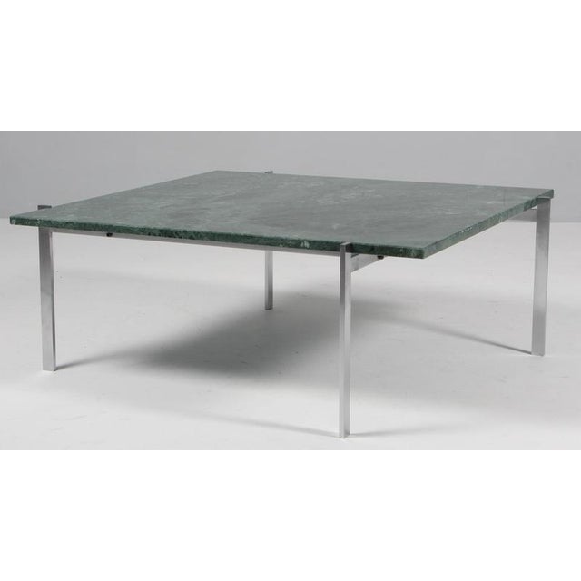 Poul Kjærholm coffee table with frame of stainless steel. New top of green Guatamala Verde marble. Model PK61, stamped by...