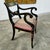 Chair made of beech wood, lacquered black, with a leaf and grape design, upholstered in fabric with a heart pattern....