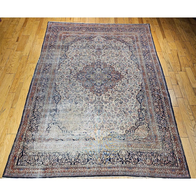 "A stunning 19th-century Persian Kashan room-size rug featuring the classical Shah Abbas floral design, expertly woven on...