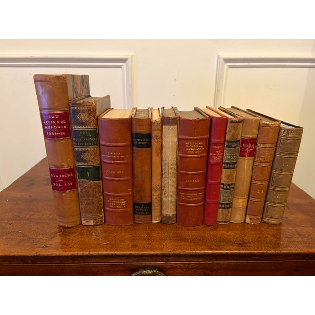 Group of 12 Antique Leather and Marbled Bound Books, 19th Century. Books are in different languages and sizes