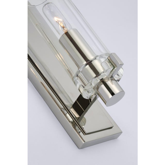 Sonnet Petite Single Sconce in Polished Nickel with Clear Glass Designer: Chapman & Myers Height: 10" Extension: 4"...
