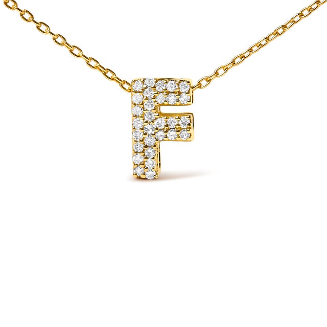 Elegance meets personalized charm in this exquisite pendant, meticulously crafted from radiant 10K yellow gold enhances...