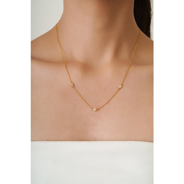 This station necklace features 0.25 carats of sparkling round diamonds set in 14K yellow gold. Each diamond measuring 1.7...
