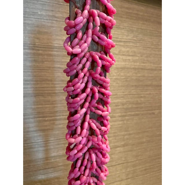A pair of currency 'swords' from the Yoruba. Originally metal wands, the plastic beads which came from travellers were...