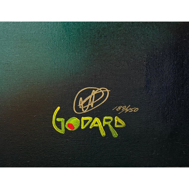 Giclee in colors with hand embellishments on canvas. Hand signed lower right by Michael Godard. Hand numbered 189/450...