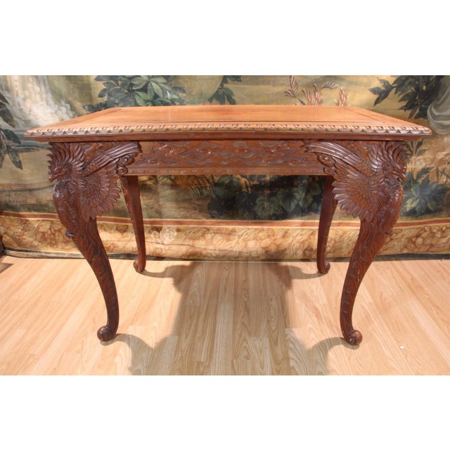 19th century carved center table, in fruit wood in the Japanese style of the end of the 19th century, very good quality of...