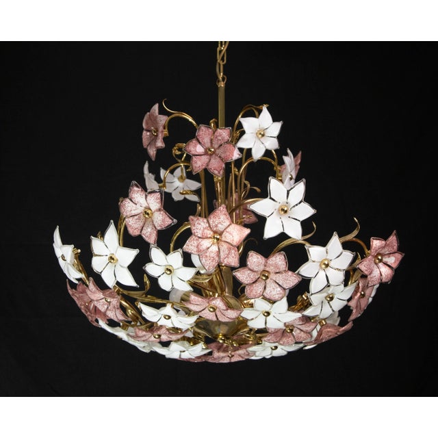 Vintage Murano glass chandelier full of white and pink flowers. The chandelier has 3 light points with E27 connection. The...