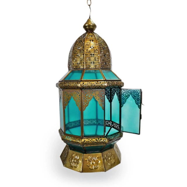 Cororful Moorish vintage hand cut brass and turquoise sprayed glass lantern. Traditional design with detailed cut brass...