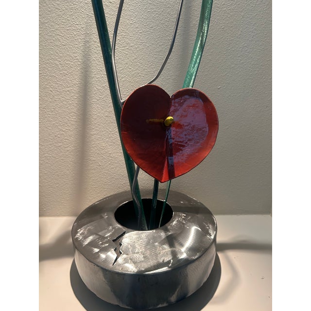 Striking handcrafted contemporary metal floral sculpture signed "K Johnson " and dated 2003 Featuring Bird of Paradise and...