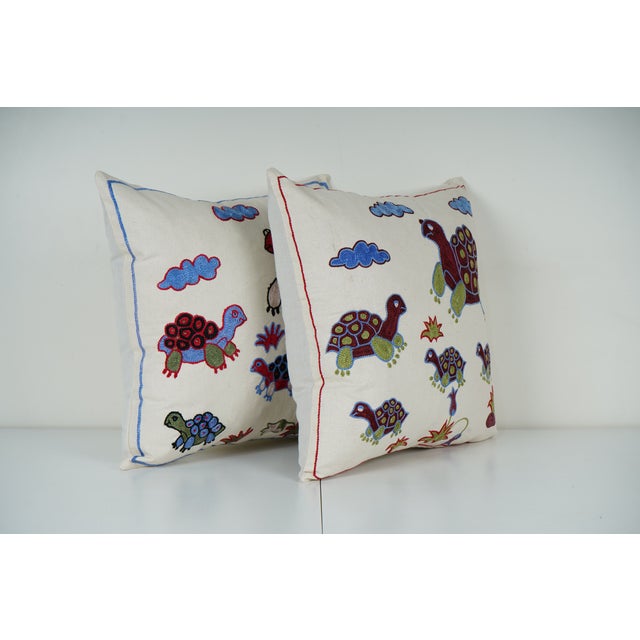 Uzbek Suzani Pillow Cover Elevate your home decor with our Turkish Suzani Pillow Cover, featuring exquisite vintage Uzbek...