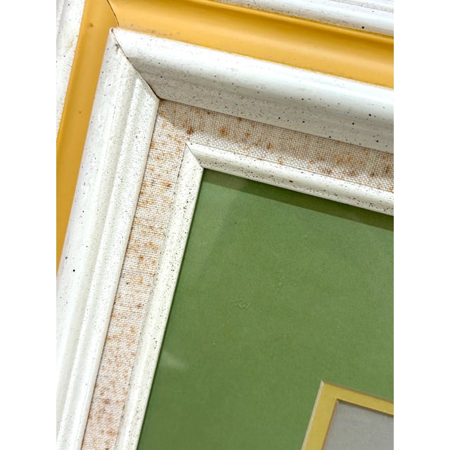 1960 profile lady portrait painting/drawing in white & yellow wood frame w/ green mat. Frame has some discoloration spots...