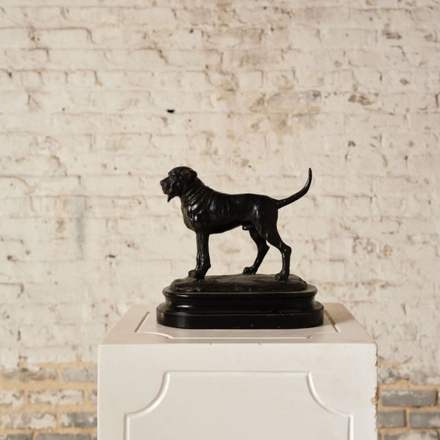 Add character and timeless charm to your space with this 19th century French bronze dog statue, a beautifully cast piece...