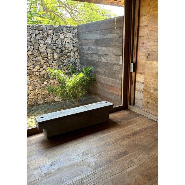 This antique Javanese rice storage chest is beautifully crafted from solid teak, showcasing the timeless skill of...