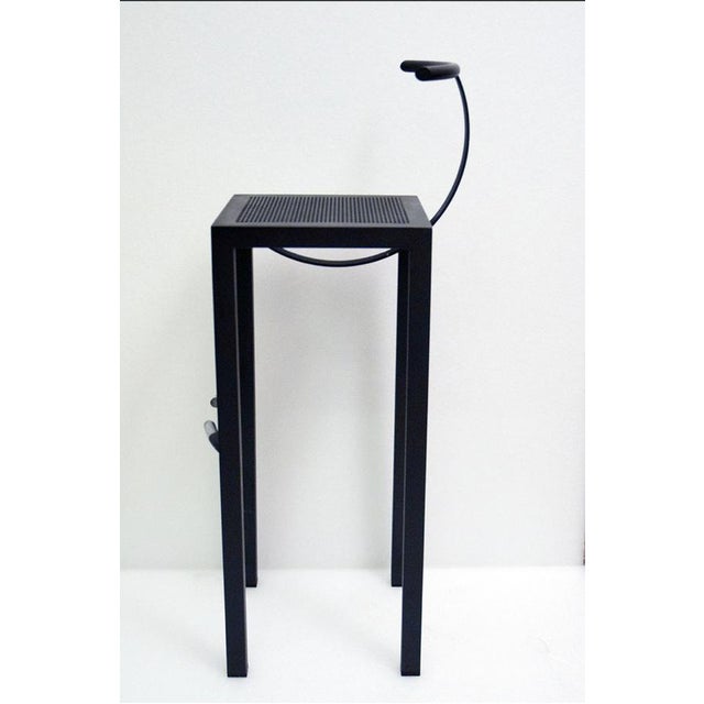 Philippe Starck Saraphis Stool, produced by Aleph, 1986. Made of black-painted metal with chrome footrests and backrest....