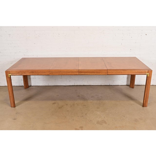 A gorgeous Mid-Century Modern Hollywood Regency Campaign extension dining table By Drexel Heritage USA, Circa 1970s...
