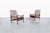 Discover the elegance of mid-century modern design with these exquisite walnut reclining lounge chairs, crafted in the...