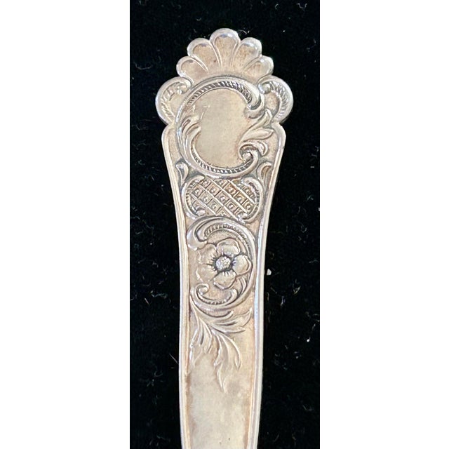 Perfect size for your delicate pastry, this English silver plated server has raised tucked edges near the handle to secure...