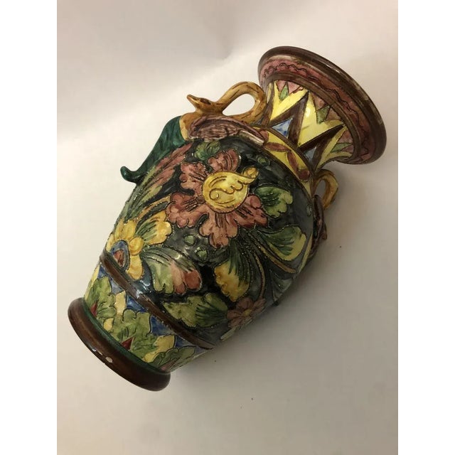 Vase out of ceramics Monaco of the Fifties. 2 birds decoration for the handles, very floral bases, very colored.