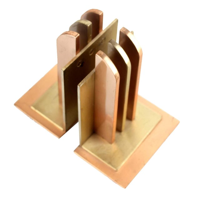 Very rare pair of machine age bookends by Chase Copper and Brass Company, Design by Walter van Nessen, solid brass and...