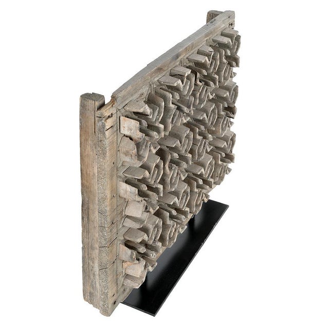 This Indian wall print mold, mounted on a metal base, makes a fascinating decorative piece, demonstrating the traditional...