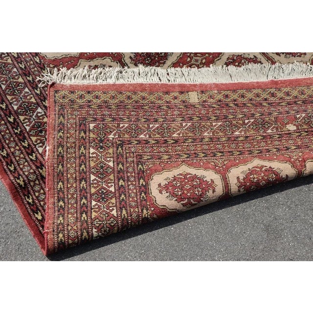 Beautiful early 20th century ( 1920s circa) antique Bokhara Rug handmade in wool. This fantastic rug with four columns of...