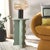 Add a touch of artistry and elegance to your home with the Lilith Wavy Accent Table in a stunning sage green finish....