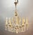 Elegant vintage crystal chandelier dating from the 1960s, featuring a beautifully balanced classical design with a nickel-...