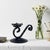 Visual Poetry in Metal: Experience the Rhythm of the Cadence Candlestick. Infuse your home with a sense of graceful...