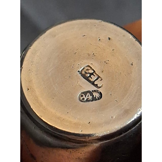 This exceptional set of three (3) Imperial Russian 84 silver Kiddush beakers offers a rare "time-capsule" look into the...