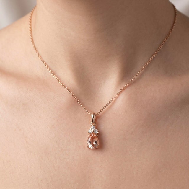 Add a touch of soft, romantic elegance to your everyday look. This breathtaking pendant features a stunning, pear-cut...
