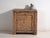 Low cabinet with a single door in elm wood, originating from shanxi province in northern china and dating to circa 1930. A...