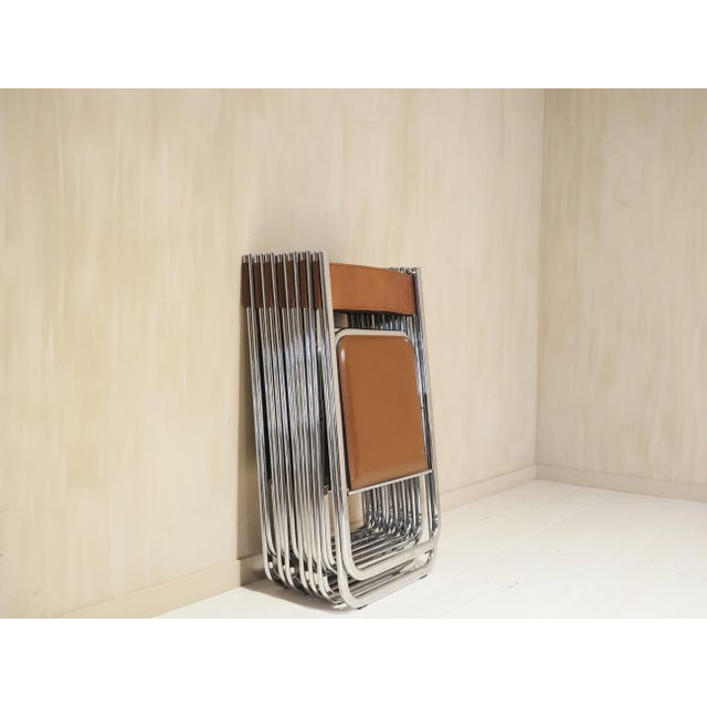 Tamara folding chairs by Arrben set of 7 Italy 1970's This piece has an attribution mark, I am sure that it is completely...