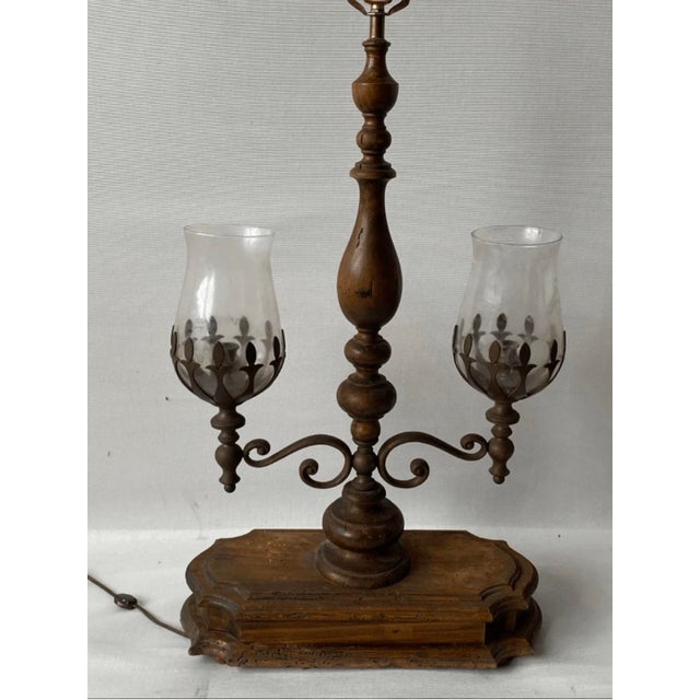 There are some small holes on the base of the lamp, but otherwise everything is in good condition. This unique piece...