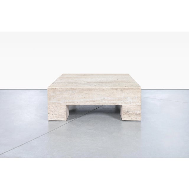 Vintage monumental Italian travertine coffee table designed in Italy, circa 1970s. The combination of the natural minerals...