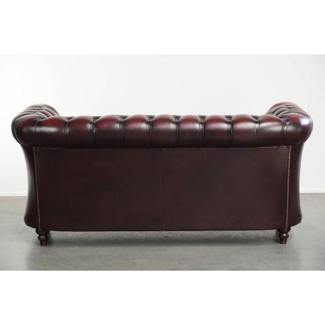 Cowhide Chesterfield 2.5-Seater Sofa in Oxblood Red For Sale - Image 3 of 14
